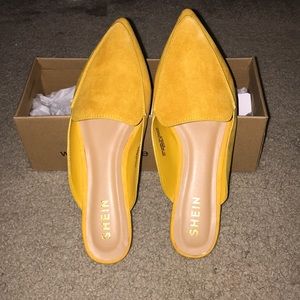 Yellow mules never worn